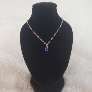 Silver necklace with blue stone